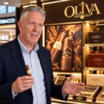 Talking about Oliva cigars in a travel retail tobacco store